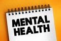 Mental Health - cognitive, behavioral, and emotional well-being, text concept on notepad Royalty Free Stock Photo