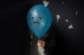 Mental Health Concept. a Stressed, Anxiety, Depressed Person with a Balloon, Negative Emotion and Feeling. Moody