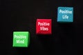 Mental Inspirational quote - Positive mind, positive vibes, positive life. With words of colorful origami paper cubes on