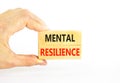Mental resilience symbol. Concept word Mental resilience typed on wooden blocks. Beautiful white table white background. Doctor