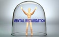 Mental retardation can separate a person from the world and lock in an isolation that limits - pictured as a human figure locked Royalty Free Stock Photo