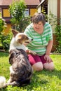 Mentally disabled woman with a second woman and a companion dog