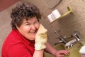 Mentally disabled woman with a washcloth Royalty Free Stock Photo