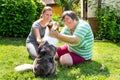 Mentally disabled woman with a second woman and a companion dog Royalty Free Stock Photo