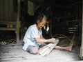 Mentawai women making handcraft in the jungle