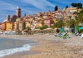 Menton. Antique multi-colored facades of medieval houses on the shore of the bay.