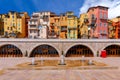 Menton. Antique multi-colored facades of medieval houses on the shore of the bay.