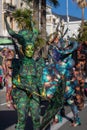 Menton, France-February 12, 2023: Unidentified woman dressed colorful green carnival costume