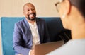 A mentor and leader. a handsome mature businessman meeting with a female colleague in the office. Royalty Free Stock Photo