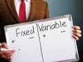 Mentor shows the fixed and variable costs difference. Royalty Free Stock Photo