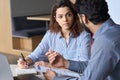 Mentoring Hispanic teacher and latin student working together on course work. Royalty Free Stock Photo