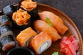 Menu of assorted sushi with salmon - Japanese cuisine Royalty Free Stock Photo