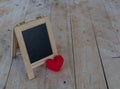 Menu board in black and red hearts set on a wooden floor Royalty Free Stock Photo