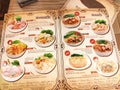 Menu book, Soup Yen tao fu, FishNoodle with Fishballs and Pork. Soup Tom Yum. menu Stewed Pork or Beef. Hong kong food menu