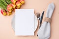 Menu card mockup. Festive table setting with a bouquet of tulips