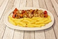 menu of chicken skewers with red peppers, cherry tomatoes and onion garnished Royalty Free Stock Photo