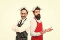 menu planning. happy chef team in apron. bearded men with recipe book. catering business. seating plan. cafe and