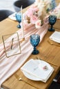 The menu on the plate. Beautiful and exquisite decoration of the wedding celebration. Banquet served table with a beige Royalty Free Stock Photo