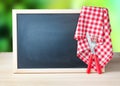 Menu recipe blackboard desorated picnic cloth. Royalty Free Stock Photo