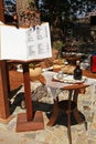 Menu of small outdoor cafe in greek village