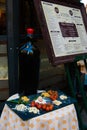 Typically Italian food exposed outside a restaurant with menu