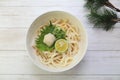 Japanese udon dishes sprinkling soup stock to noodles directly