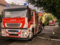 Merano, italy, 16/09/2020 fearless firefighters engaged in operation with ladder trucks and fire trucks