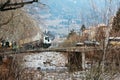 Merano, Italy - 03 20 2013: view of the streets of Merano, Italian Alpen cityscape in winter, bridge