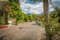 Merano in South Tyrol, a beautiful city of Trentino Alto Adige, View on the famous promenade along the Passirio river. Italy.