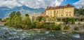 Merano in South Tyrol, a beautiful city of Trentino Alto Adige, View on the famous promenade along the Passirio river. Italy. Royalty Free Stock Photo