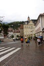 Merano, a street in the center with Porta Bolzano in the background, one of the four gates to the town Royalty Free Stock Photo