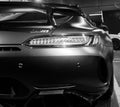 Mercedes-Benz AMG GTR 2018 V8 Bi-turbo exterior details, Headlight. Back view. Car exterior details. Black and white