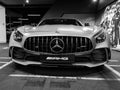 Mercedes-Benz AMG GTR 2018 V8 Biturbo exterior details, Headlight. Front view. Car exterior details. Black and white