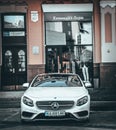 Mercedes-Benz C-Class C300 parked in front of an Ermenegildo Zegna shop