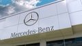 Mercedes-Benz logo on the modern building facade. Editorial 3D rendering