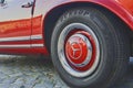 Mercedes Benz logo on vintage car wheel. Dunlop logo on tyre. Mercedes-Benz is a German automobile manufacturer. The