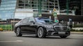 Mercedes-Benz S-Class (W223) S450 4MATIC on the road in motion. Fast speed drive on city road. Front side view