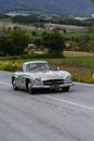 MERCEDES-BENZ 300 SL W 198 1955 an old racing car in rally Mille Miglia 2020 the famous italian historical race 1927-1957v Royalty Free Stock Photo