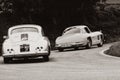 MERCEDES-BENZ 300 SL W 198 1955 PORSCHE 356 1600 COUPÃâ° 1956 on an old racing car in rally Mille Miglia 2020 the famous italian Royalty Free Stock Photo