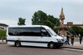 Mercedes-Benz Sprinter touristic shuttle bus of the Escocia Turismo company in the Glasgow Green park in front of the Doulton Royalty Free Stock Photo