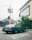 Mercedes 560 SEL, on a foggy morning in West Portal, San Francisco, California