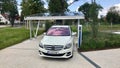 Merceds B-CLass electric car being charged