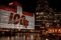  The Chicago Bears NFL is celebrating it's 100th playing season with wall art at night on the Merchandise Mart facade.