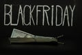 Merchandise sale concept, black friday. Cash dollars on a black background Royalty Free Stock Photo