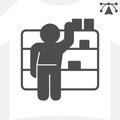 Merchandiser man at shelves with goods solid icon, market concept. Vector graphics. Worker sign and editable stroke Royalty Free Stock Photo