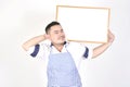 Merchant Asian man in white and blue apron to holding blank white broad for put some text or wording for present advertising