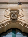 The merchant head on Bertini Palace, in Ragusa, Sicily, Italy Royalty Free Stock Photo