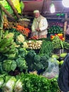 Vegetable merchant in Dhaka, Bangladesh