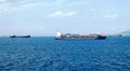 Merchant vessels and cargo container ships entering the port Royalty Free Stock Photo