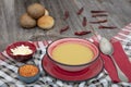 Mercimek corbasi, red lentil soup, turkish cuisine.  bowl of soup, parsley and croutons on wooden table Royalty Free Stock Photo